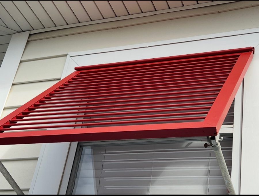 red painted metal window awning Preview Image 1