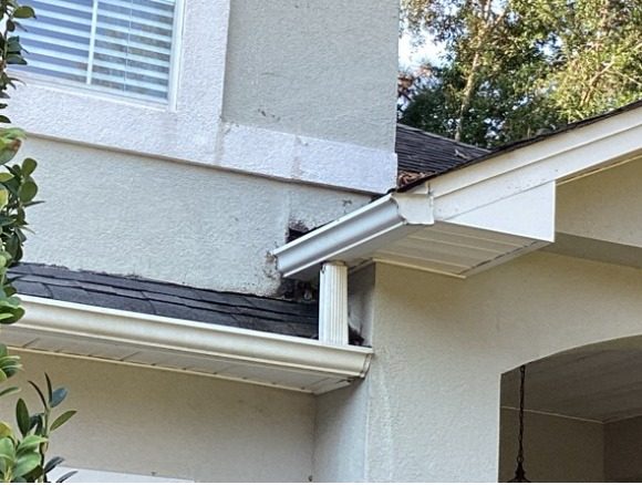 areas of worn stucco on house exterior Preview Image 4