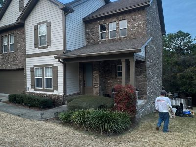 painted brick and stucco home exterior