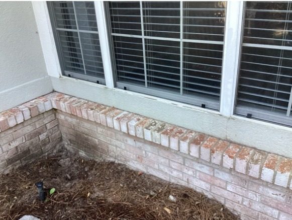 worn stucco and brick exterior Preview Image 6