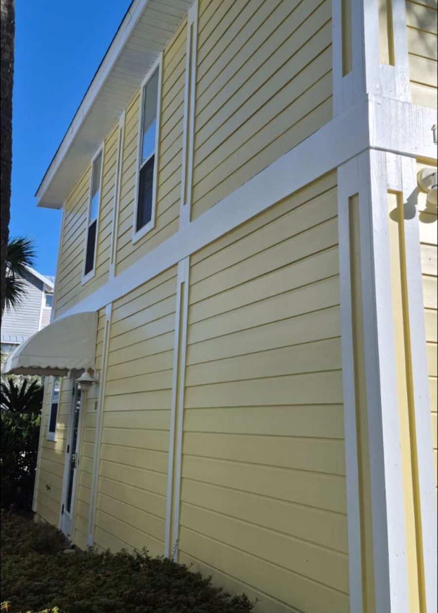 house with yellow painted siding and white trim Preview Image 1
