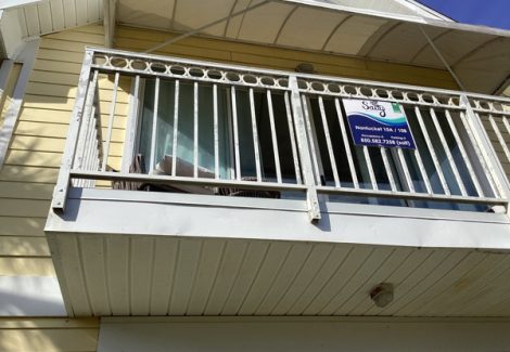 balcony with discolored paint