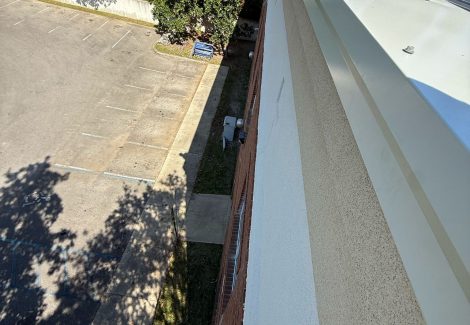 roof of stucco and brick commercial building