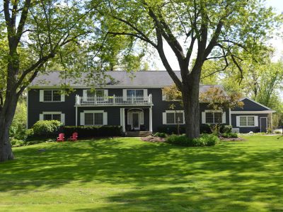 Exterior house painting by CertaPro painters in Franklin, MI