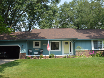 front of blue house and front yard