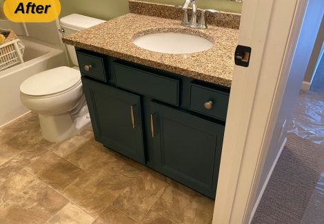 blue painted single sink bathroom vanity