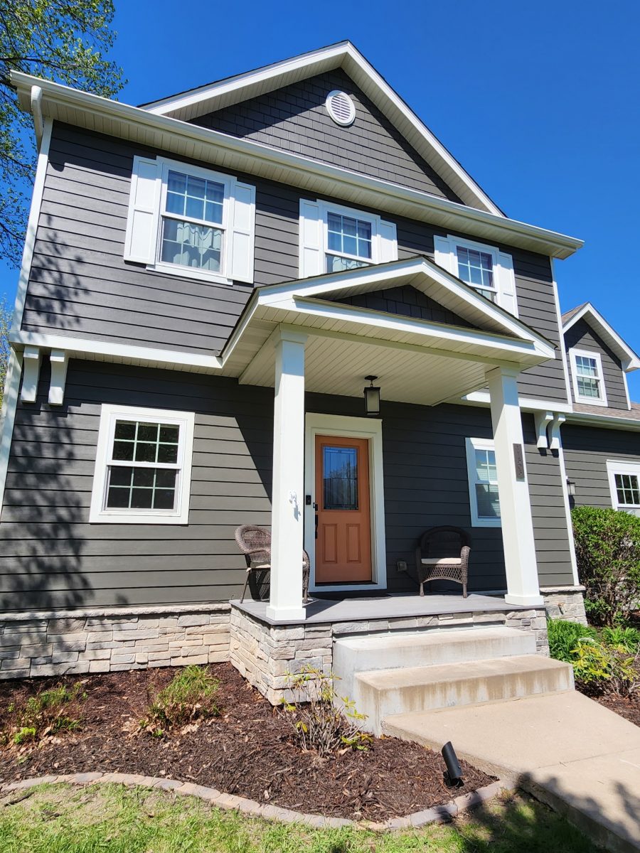 front entrance of house with gray siding Preview Image 1