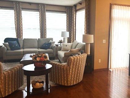 before photo of living room with couch and armchairs Preview Image 4