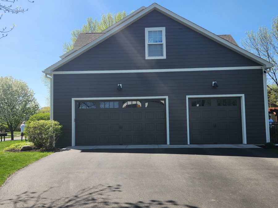 garage side of house with gray siding and driveway Preview Image 2