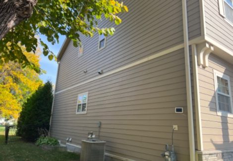 side of house with beige siding