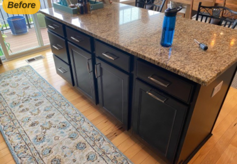 kitchen island with black cabinets