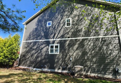 side of house with gray painted siding