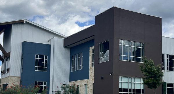 exterior of painted event center building