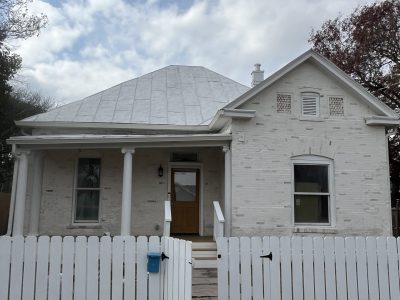 limewashed brick house