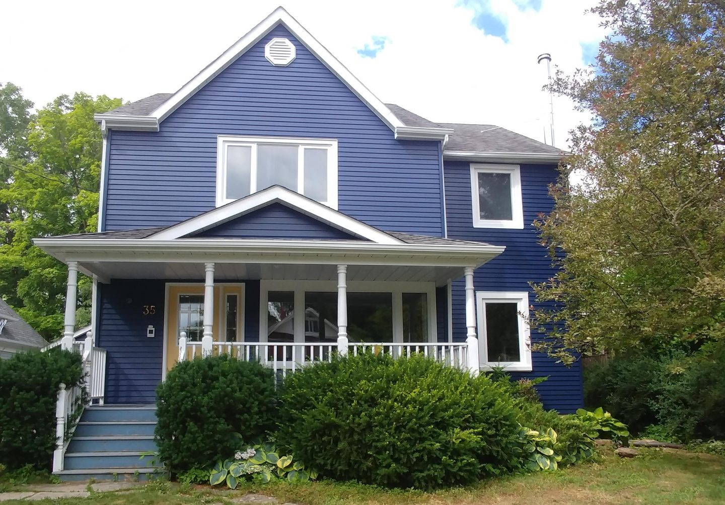Blue exterior painting project after photo