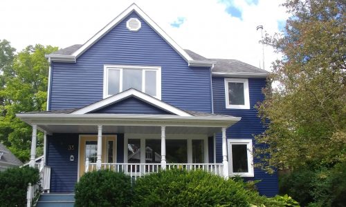 Blue exterior painting project after photo
