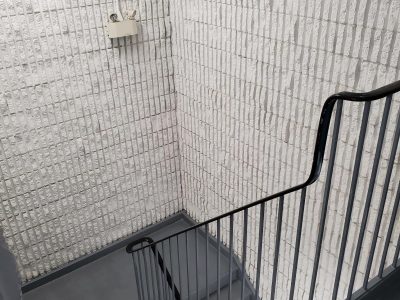 distribution center stairwell painted grey