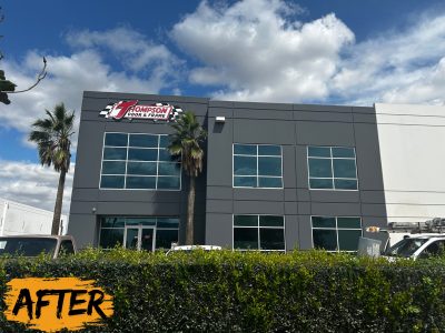 repainted dark grey commercial building exterior