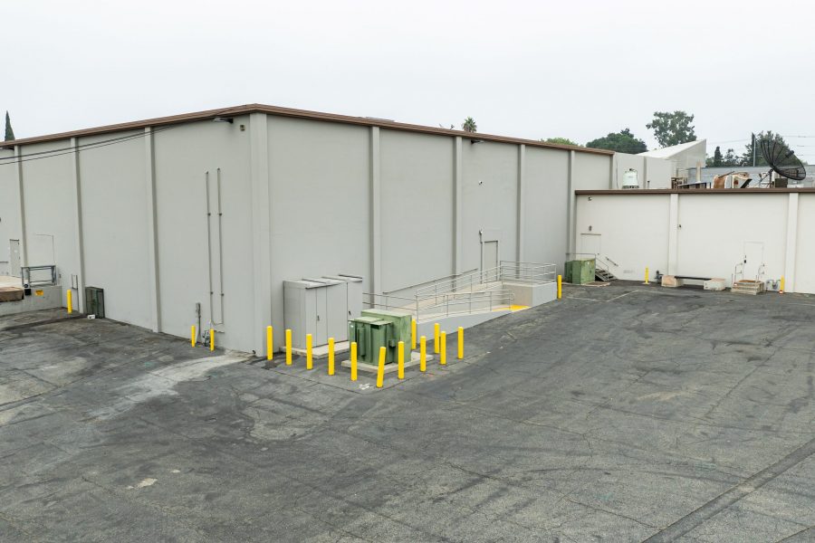rear side of painted shopping center exterior Preview Image 6