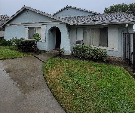 front of apartment building with worn paint Preview Image 6