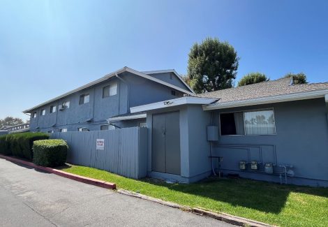 rear view of painted apartment building in Orange County, CA