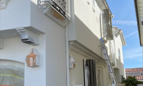 Sideview of Home During Primer Application