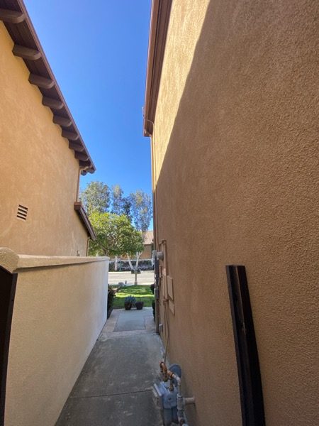 tan stucco house exterior before repaint Preview Image 5