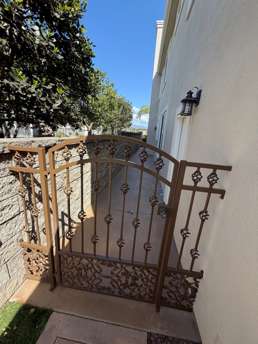 metal gate against house Preview Image 3