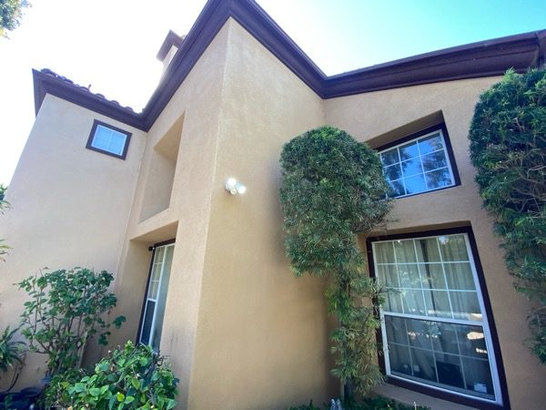 tan stucco house exterior before repaint Preview Image 4