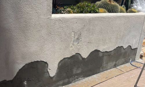 The stucco is removed until you reach were it is still adhering to the wall firmly.