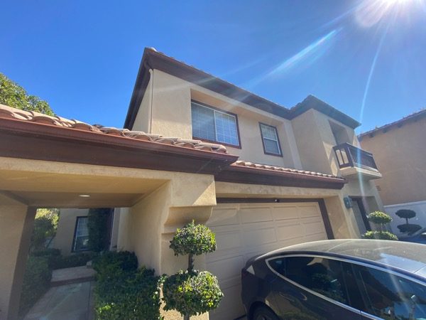 tan stucco house exterior before repaint Preview Image 3