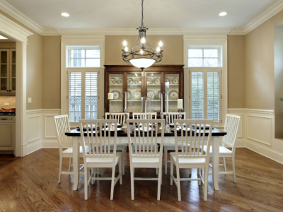 Residential painting in tan colored dining room