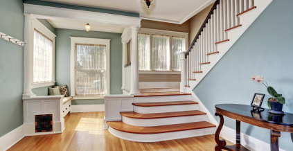 Stained Flooring & Blue Walls Foyer