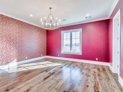 bright pink room with wallpaper
