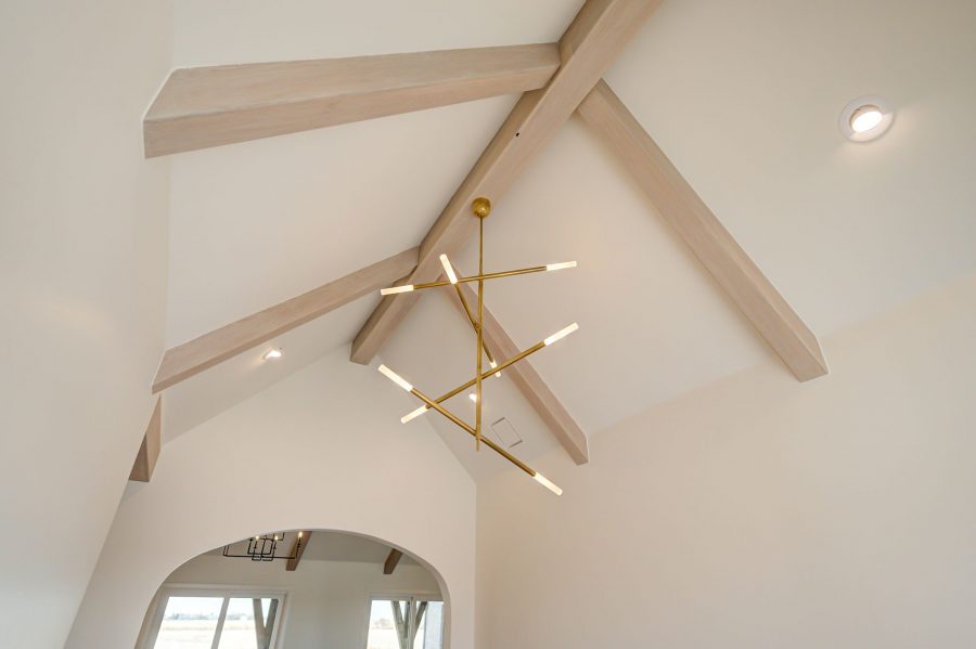overhead beams and chandelier in foyer Preview Image 2