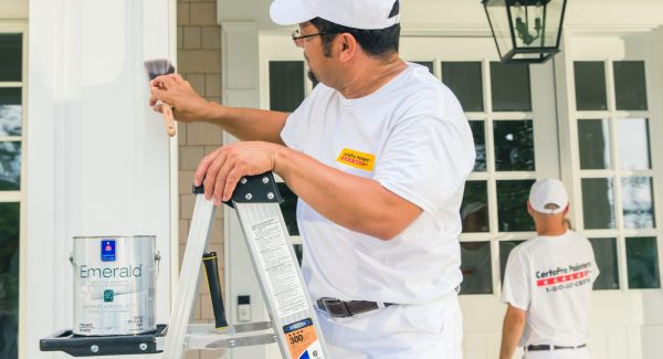 painters painting outdoor porch