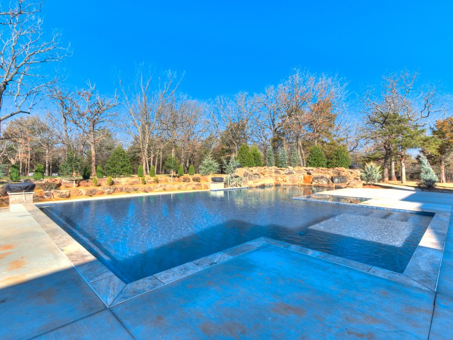 pool and concrete in backyard of large house Preview Image 4