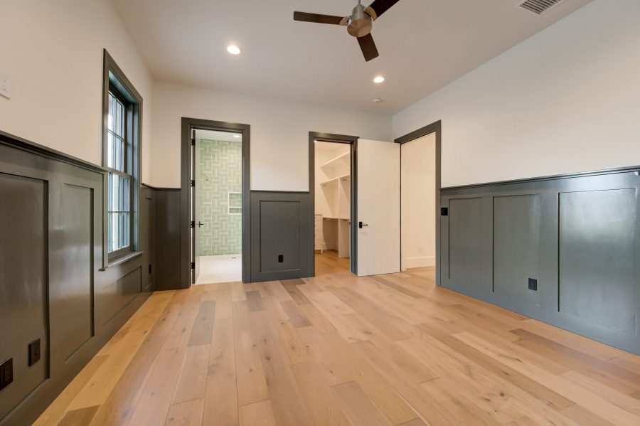 bedroom with green accent color, closet and bathroom Preview Image 1