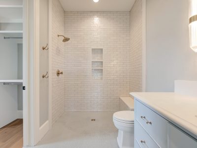 walk in shower with closet entryway
