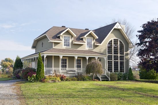 traditional home with porch and white windows