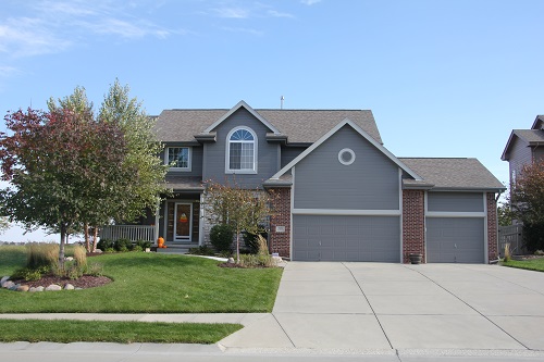 Exterior house painting by CertaPro painters in Gretna, NE