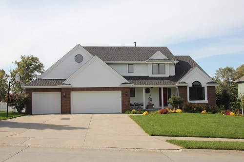 Exterior painting by CertaPro house painters in Omaha, NE
