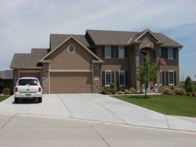 Exterior painting by CertaPro house painters in Papillion, NE