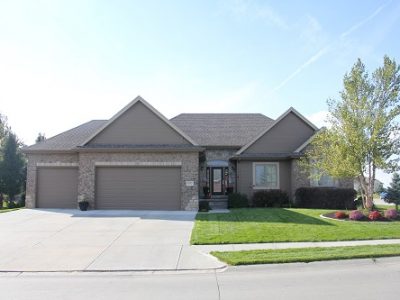Exterior house painting by CertaPro painters in Gretna, NE