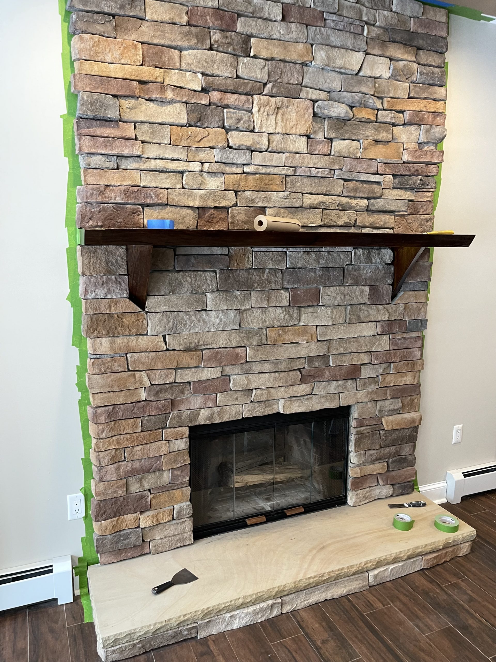 Fireplace in Florida, NY, before residential interior painting project by CertaPro Painters of Orange County, NY.