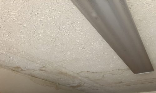 Drywall ceiling with stains