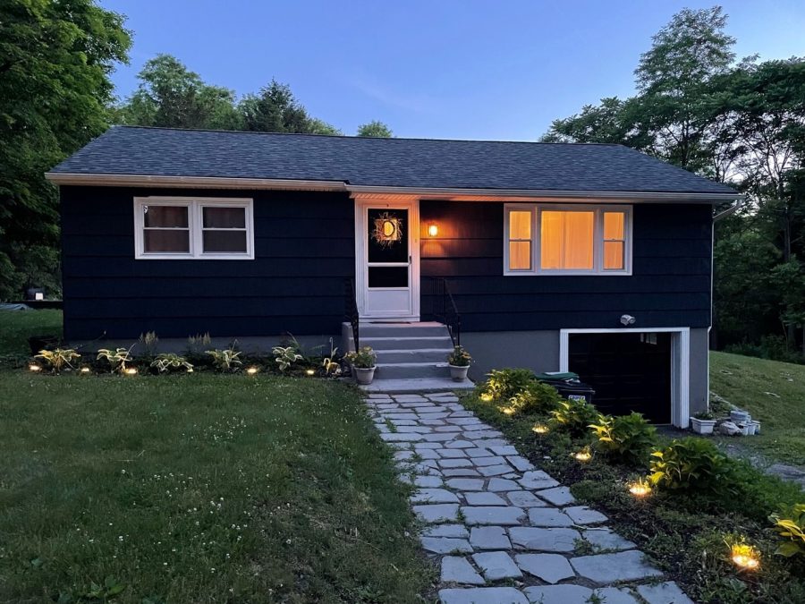 Front of Dark Blue House after Residential Exterior Painting Project by CertaPro Painters of Orange County, NY - Angle 2 Preview Image 1
