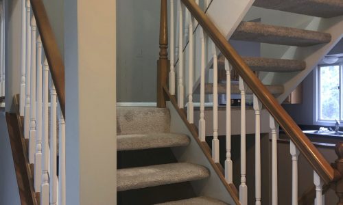 Condo Staircase Completed by CertaPro Painters of Oswego