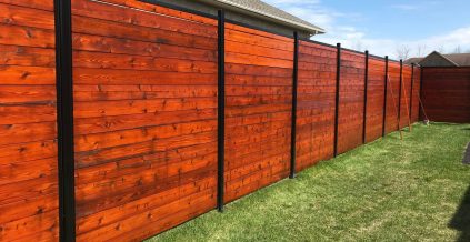 Burgundy Brown Fence Staining Project