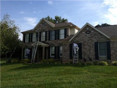 Exterior house painting by CertaPro painters in Woodstock